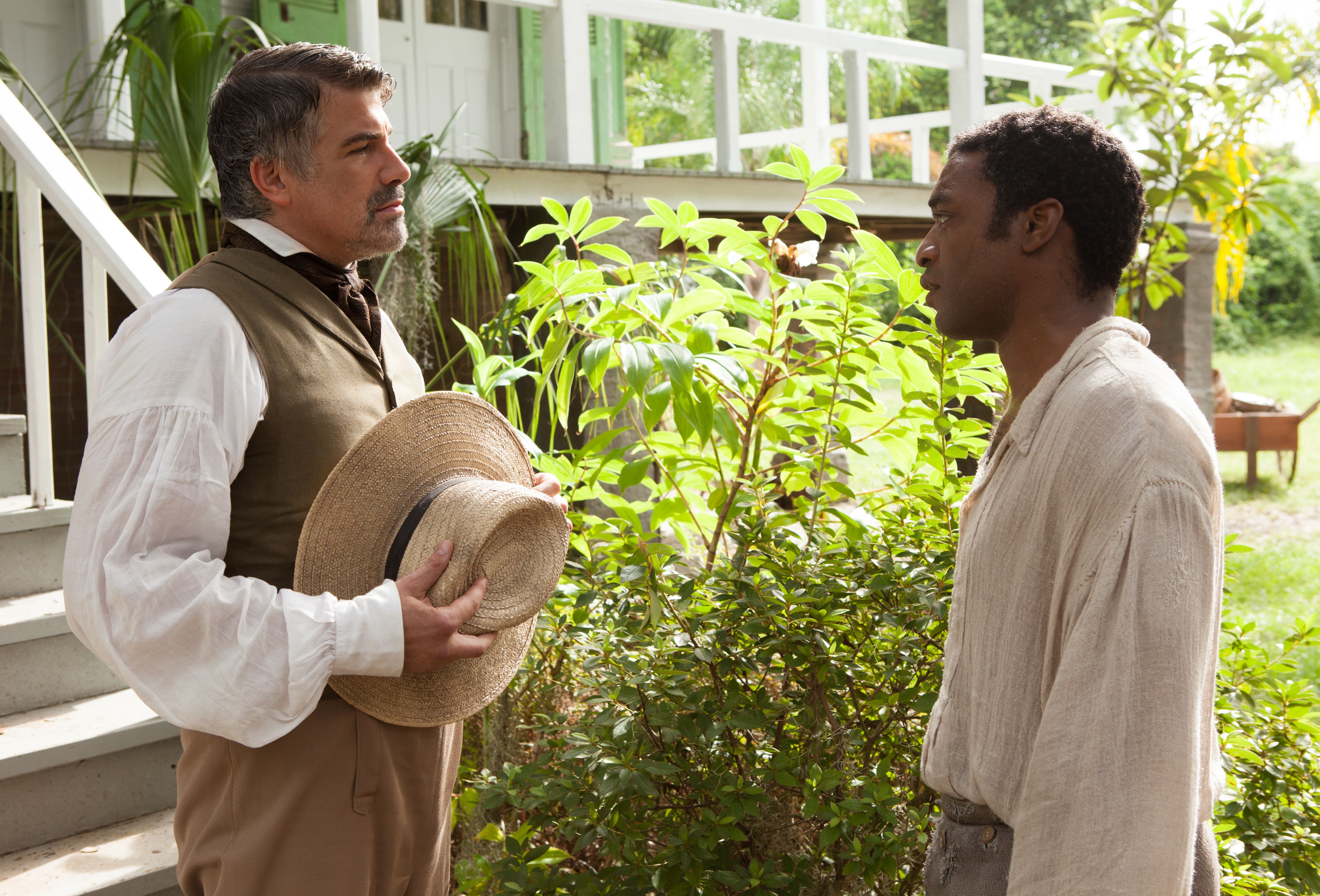 Bryan Batt and Chiwetel Ejiofor having a conversation in 12 