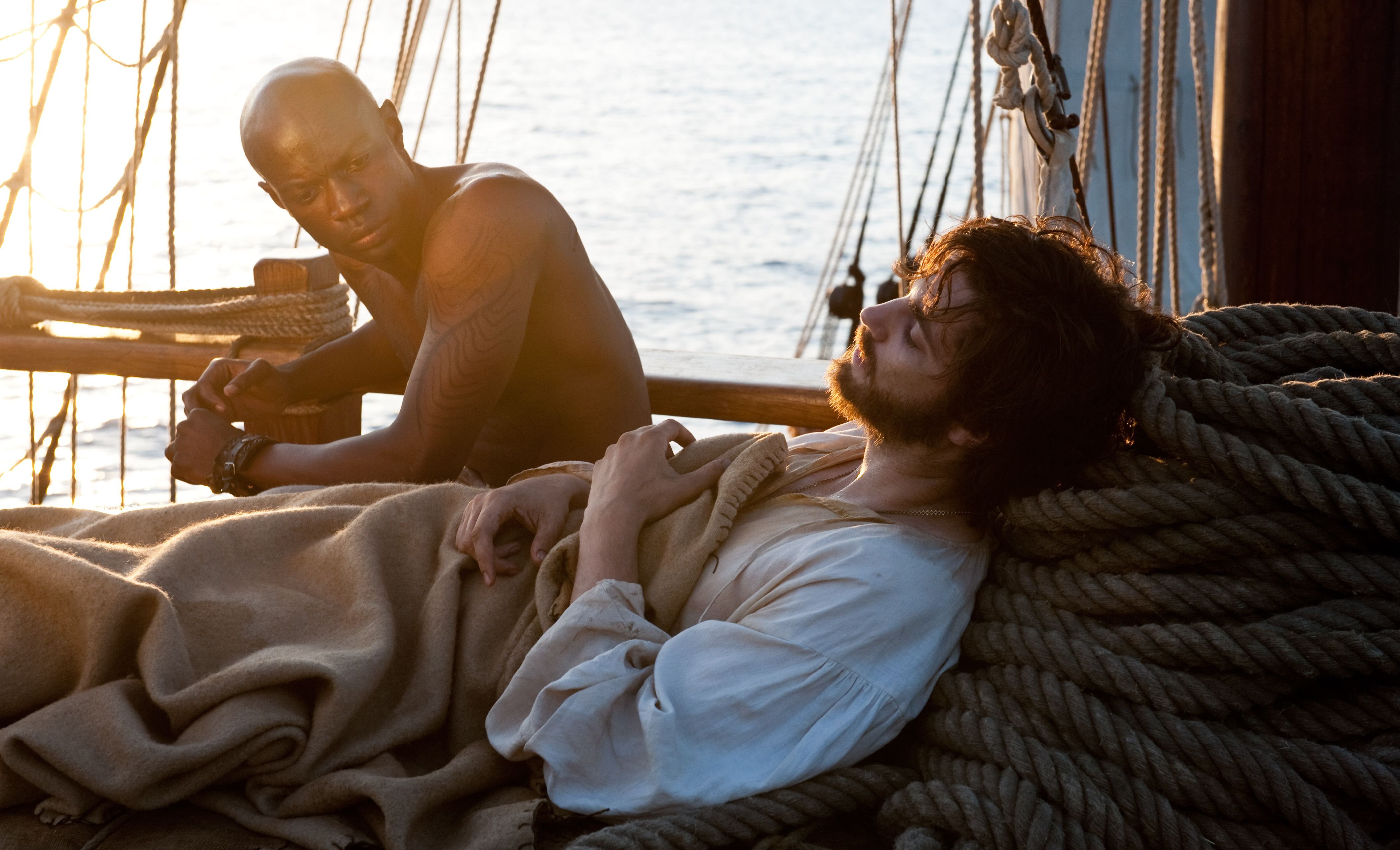 David Gyasi and Jim Sturgess on a boat in Cloud Atlas