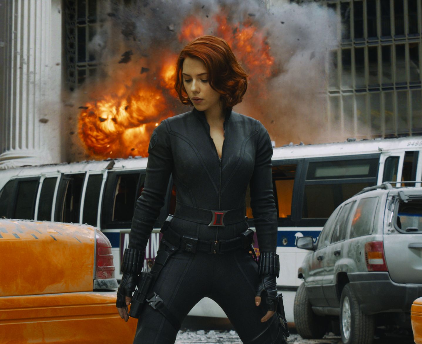 Scarlett Johansson as Black Widow and big fire on the street