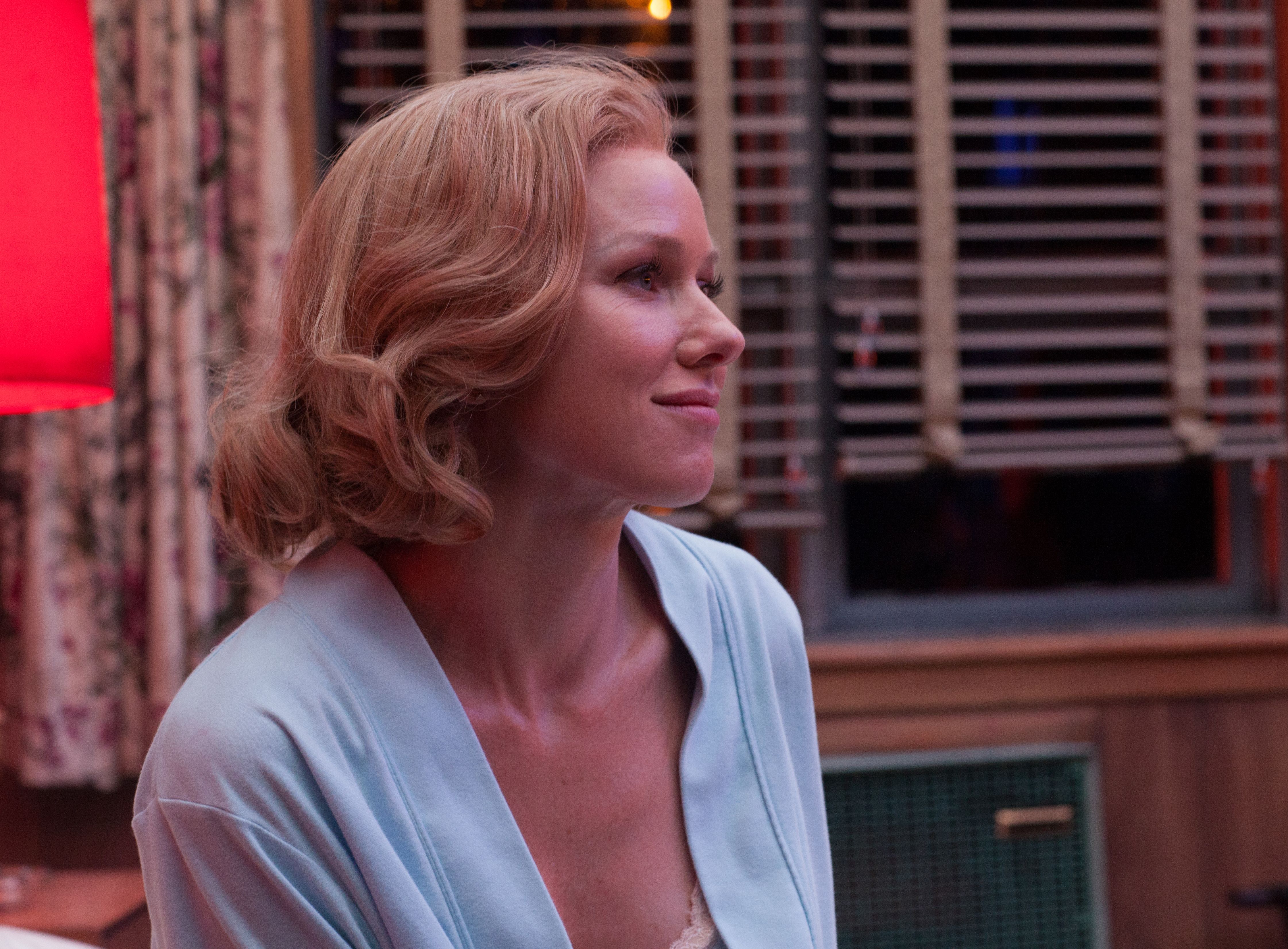 Naomi Watts somewhat smiling in Birdman