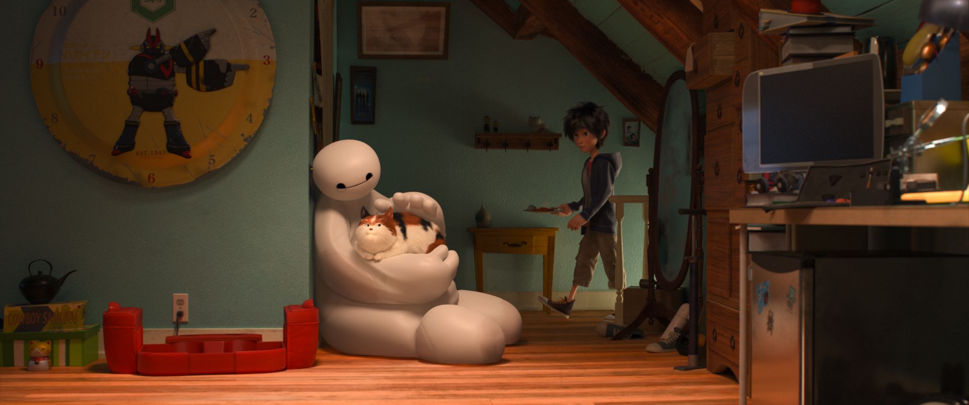 The lovable Baymax stroking a cat