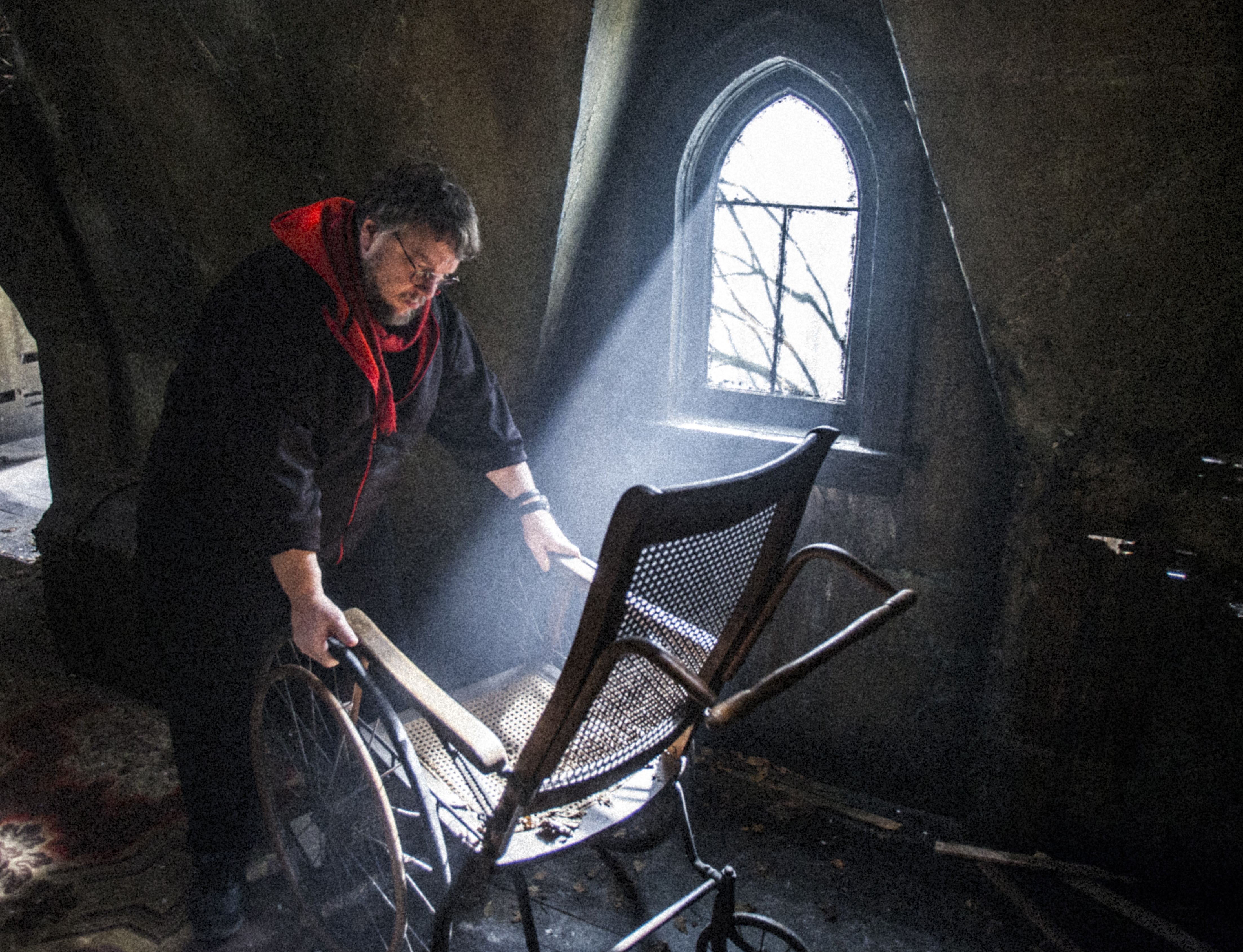 Guillermo del Toro handles old chair in Crimson Peak