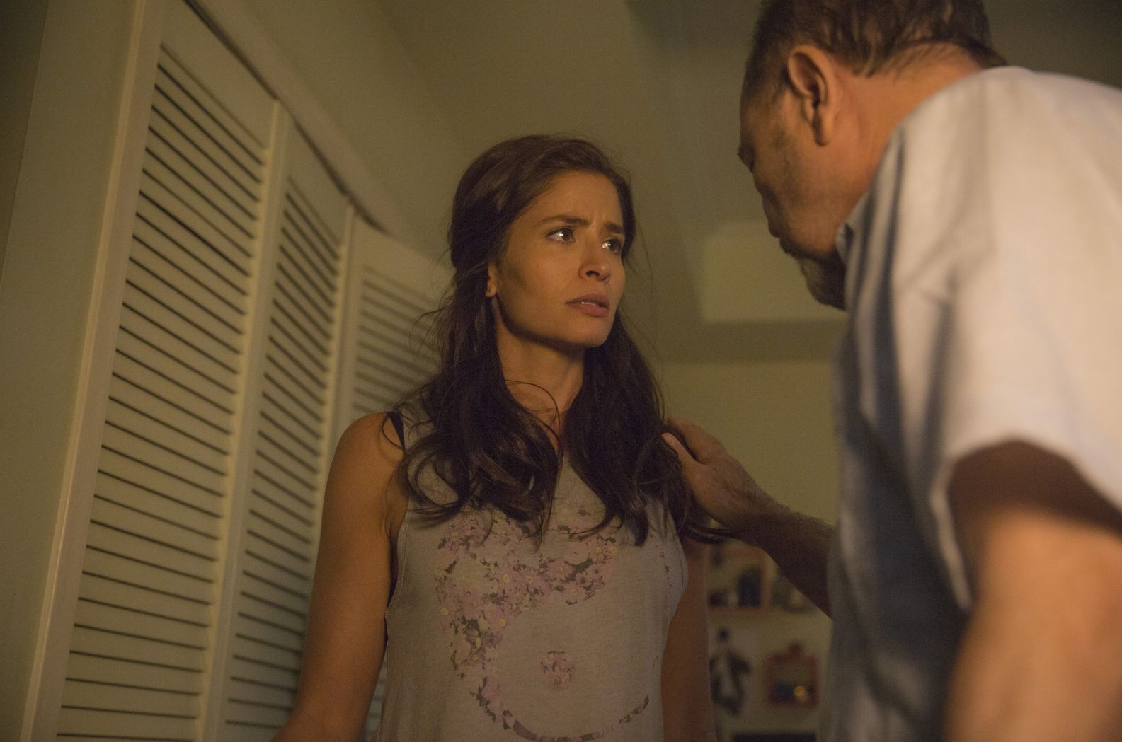 Mercedes Mason and Ruben Blades as Ofelia and Daniel Salazar