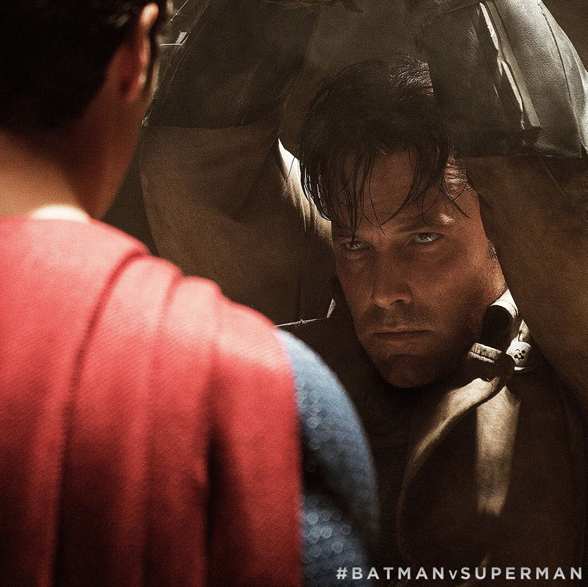 Bruce Wayne stares down Superman