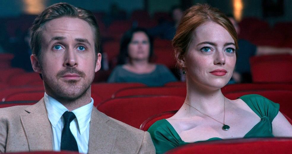Ryan Gosling and Emma Stone watch a movie in &#039;La La Land&#039;