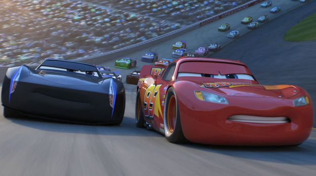 Jackson Storm and Lightning McQueen battle for the lead in &quot;Cars 3&quot;
