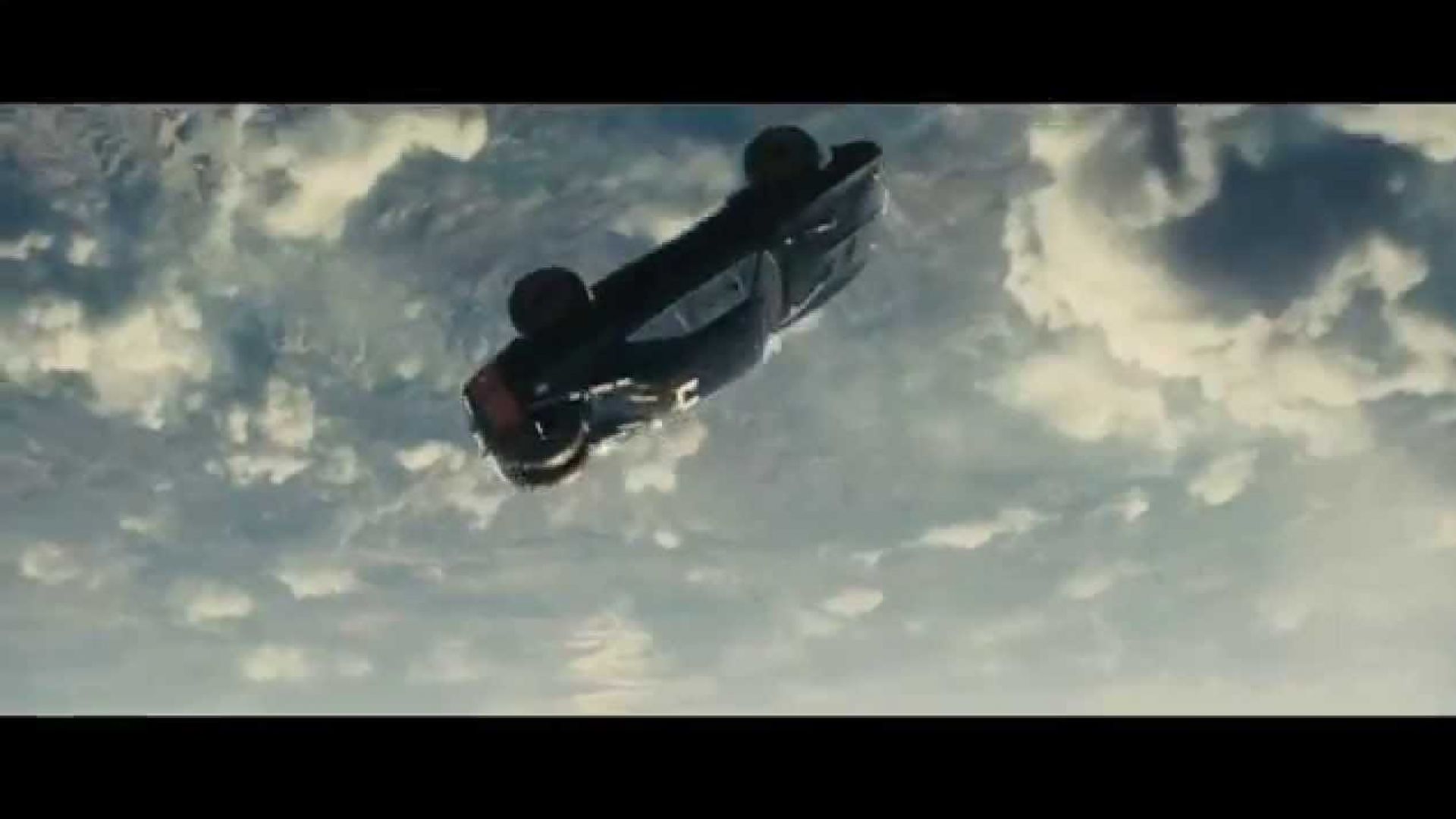 Roman gets dragged out of plane in Furious 7 flying cars clip